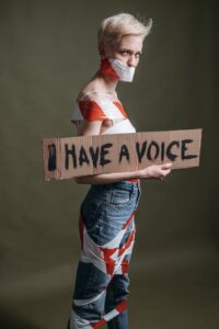 woman wrapped in a red and white ribbon