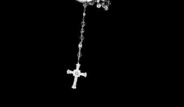 crop woman with cross on chain