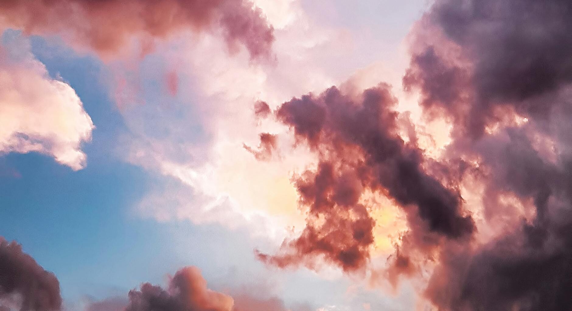down angle photography of red clouds and blue sky