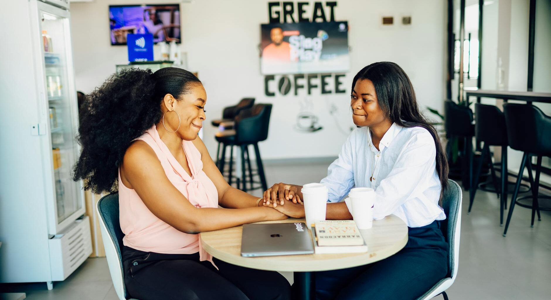 happy women enjoying coffee at lagos cafe