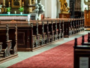 elegant church interior with wooden pews