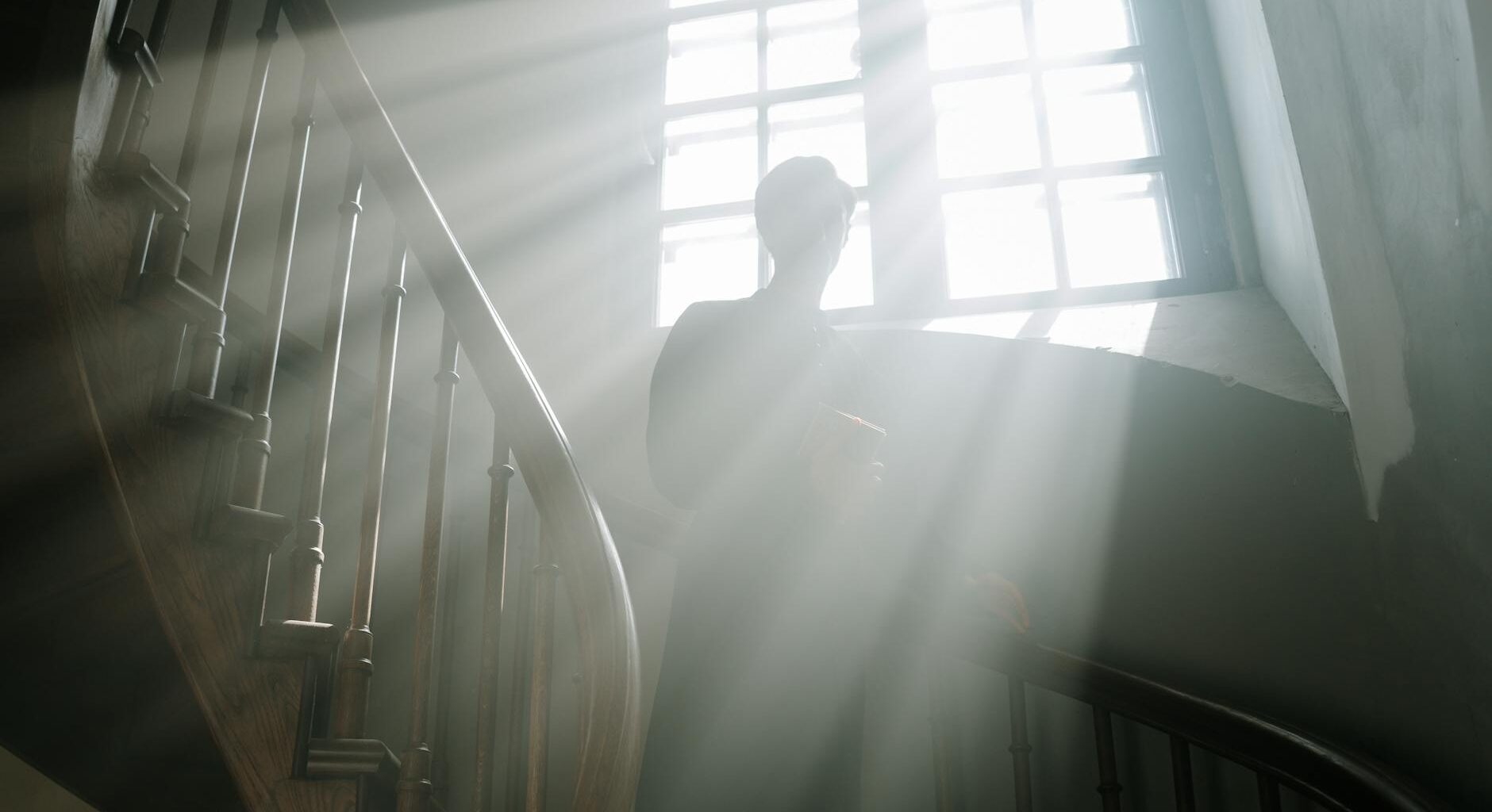 priest preaching from a pulpit