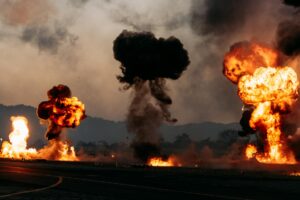 dramatic fire and explosion scene outdoors