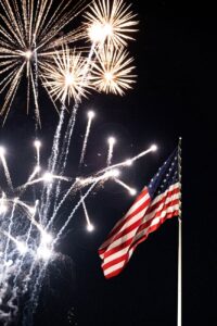 the flag of america during a fireworks display