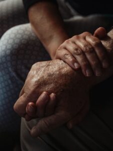 a close up shot of people holding hands