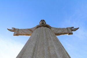 christ the king statue against clear blue sky