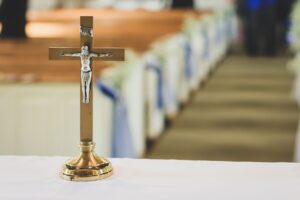 brown and silver cross table decor