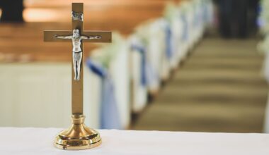 brown and silver cross table decor