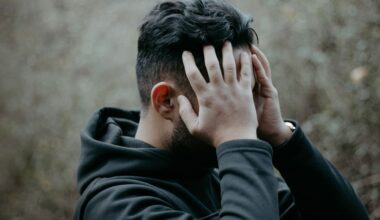 a man holding his head