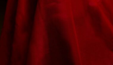a person covered with red cloth